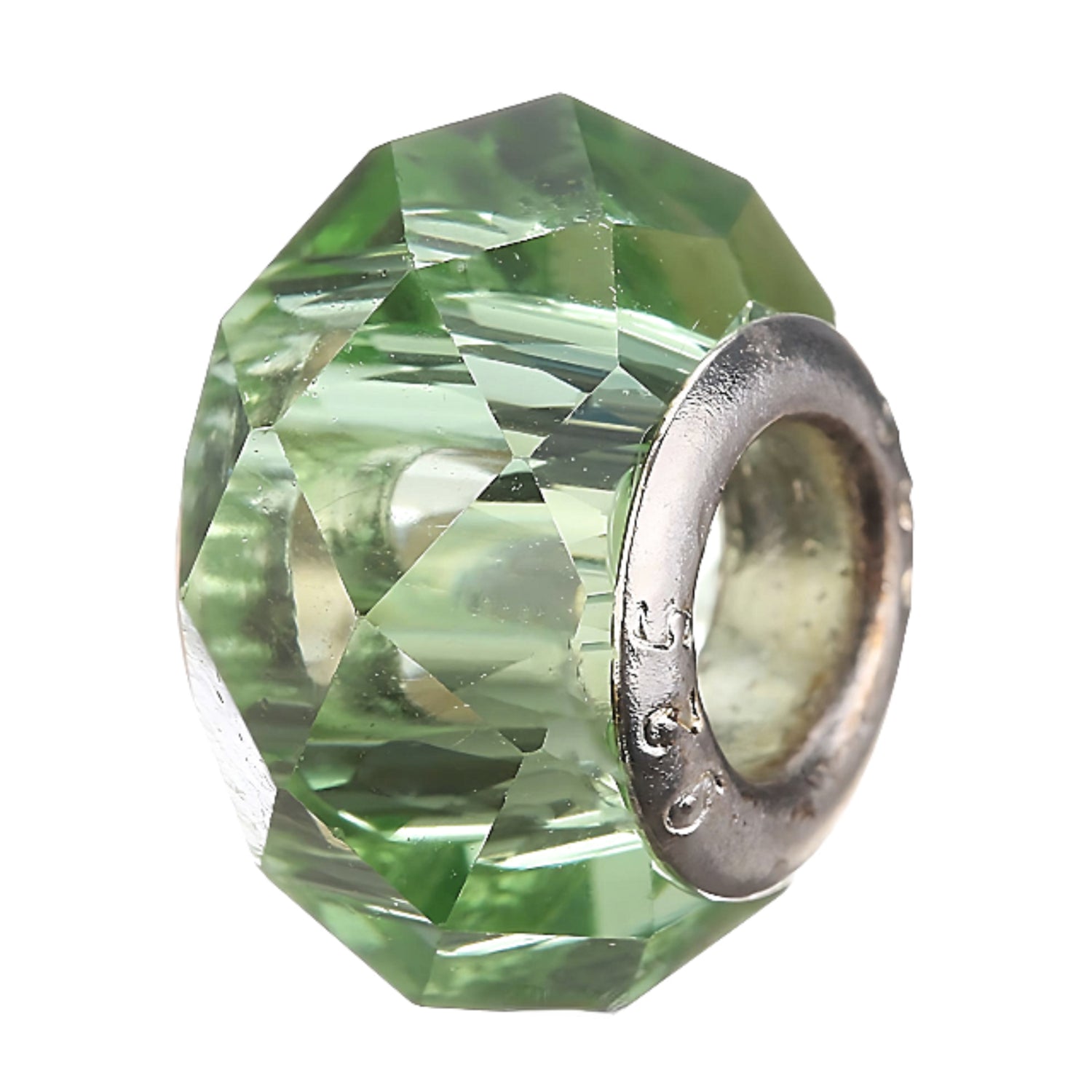 a faceted glass bead in light green color