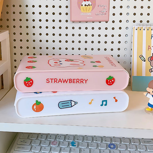 a pink and a white Kawaii storage boxes on a shelf